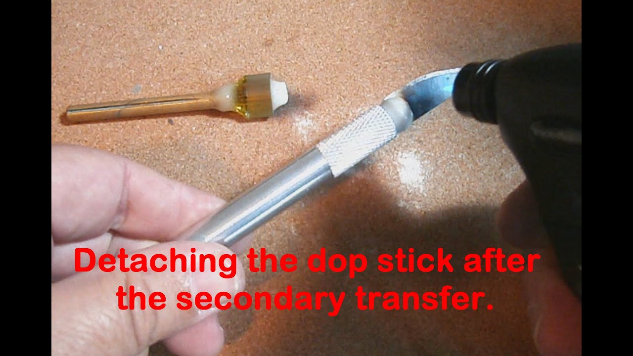 Detaching the dop stick after the secondary transfer.