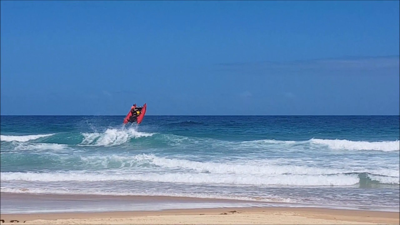 Thunder cat wave jumping along beach