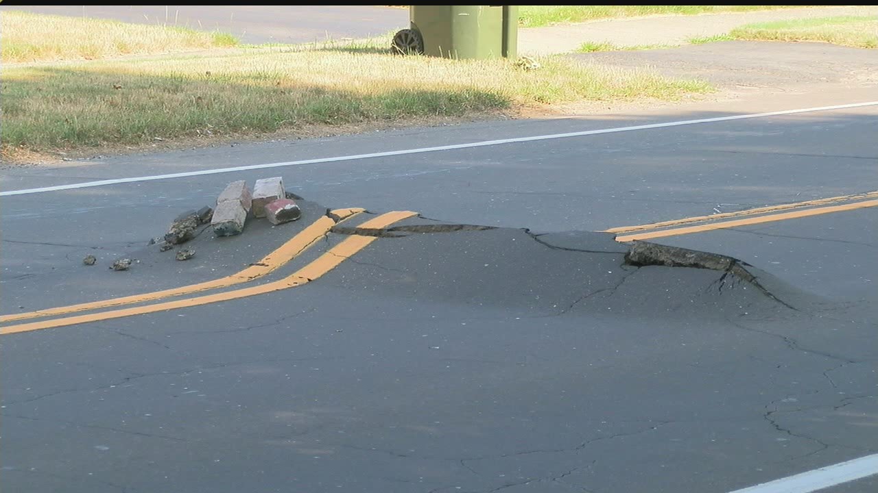 Road buckles at intersection in Poland