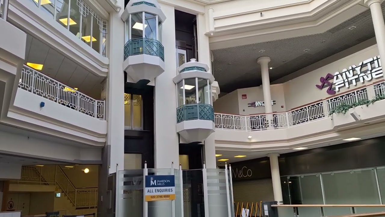 1990 Glass KONE lift in Hart Shopping Centre, Fleet