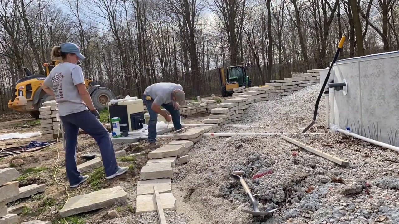 Timelapse of building a Natural Stone Retaining Wall with Stone from Buechel Stone