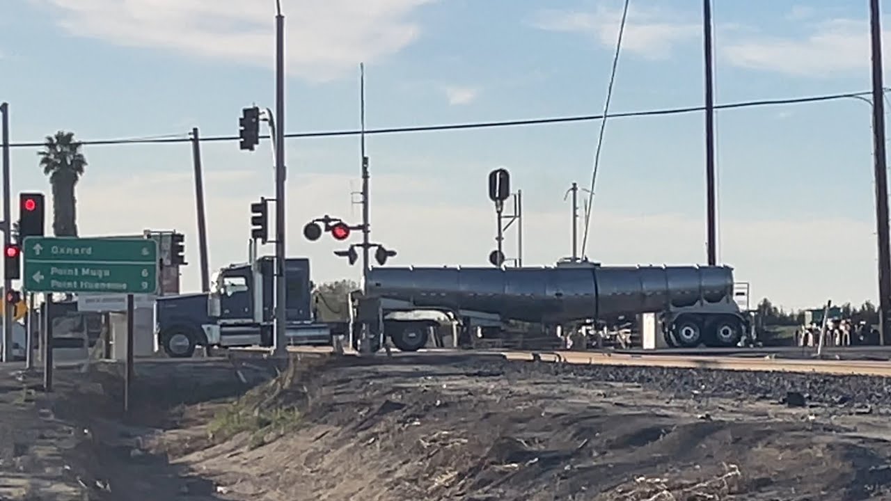 LOF67 Union Pacific manifest freight train through Oxnard California. +switching and near miss