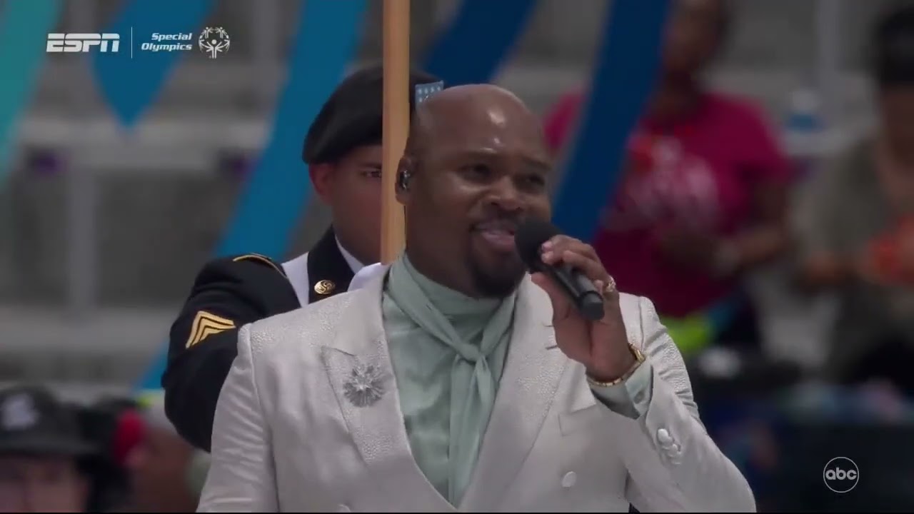 ALADDIN's Michael James Scott Perform the National Anthem at the Special Olympics Opening Ceremony