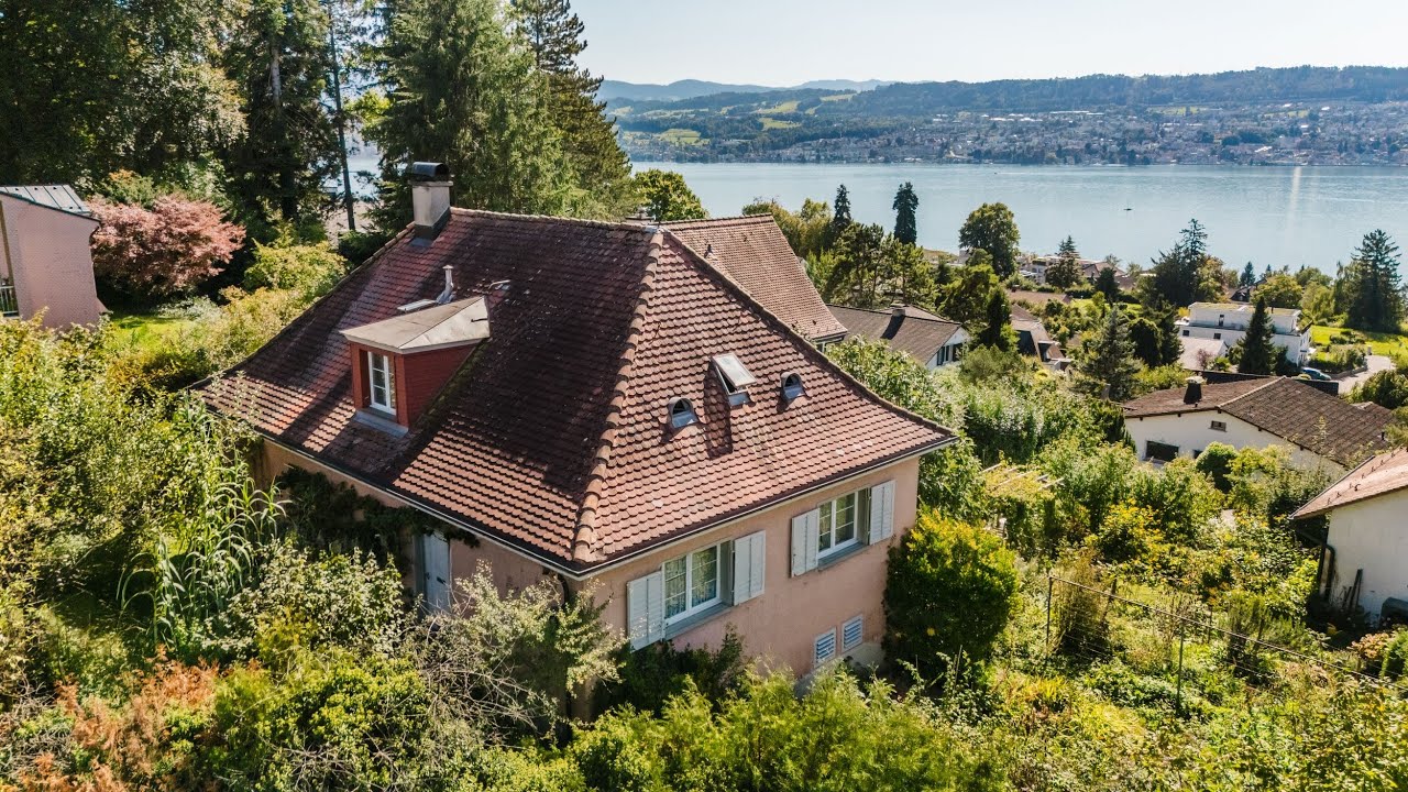 Verträumtes Einfamilienhaus mit Seeblick und idyllischem Garten