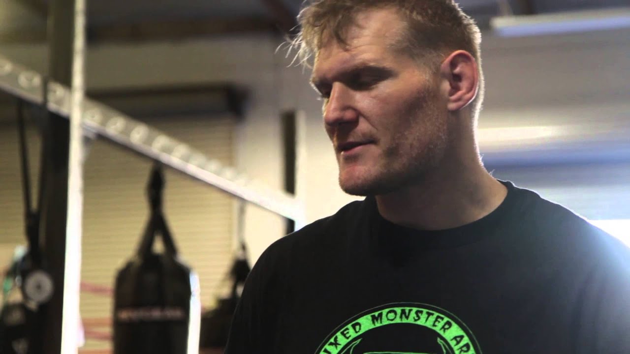 Travis Newaza learning from Josh Barnett at CSW