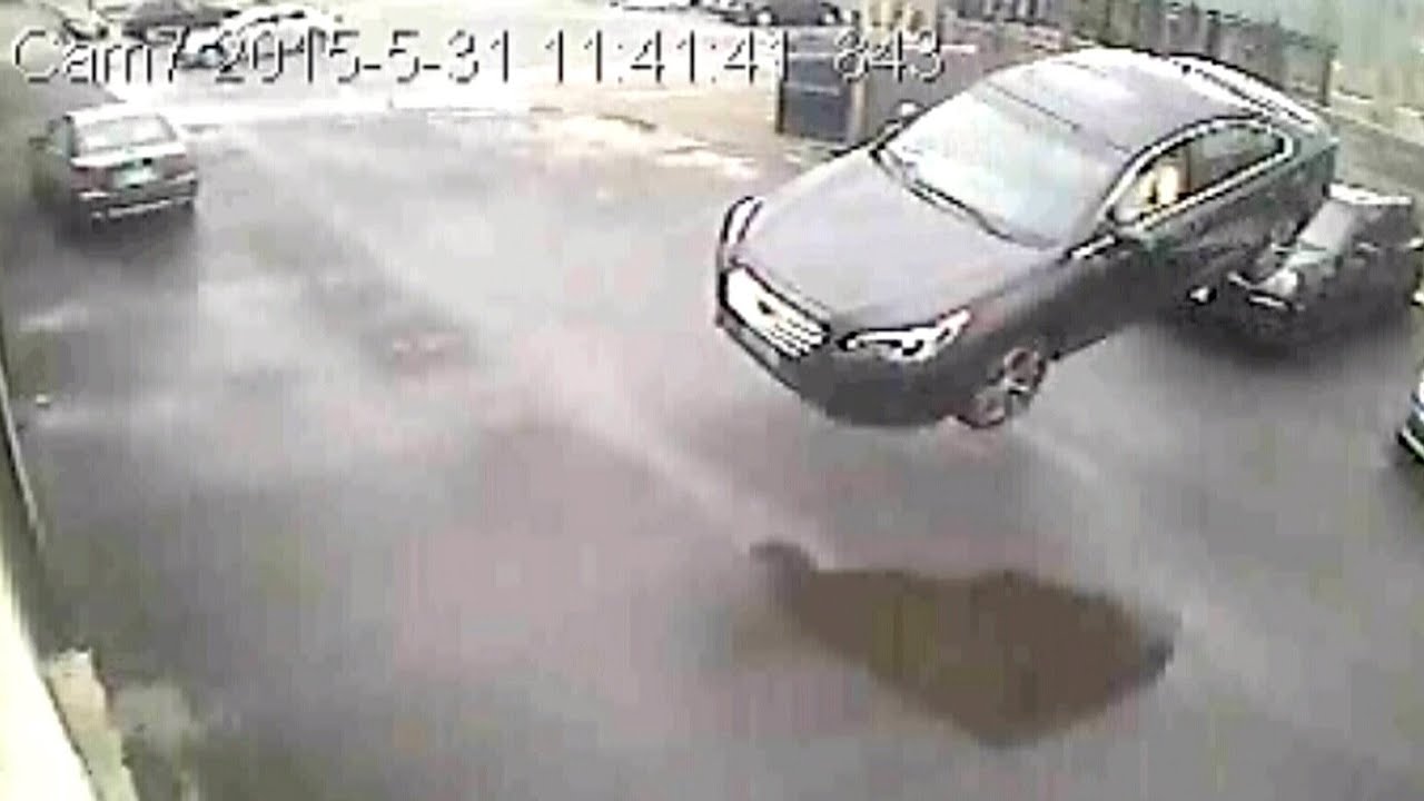 Caught on cam: Car goes airborne before crashing into wall
