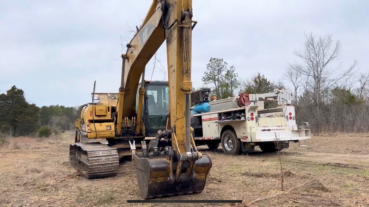 Cat 320C engine oil cooler field service repair.