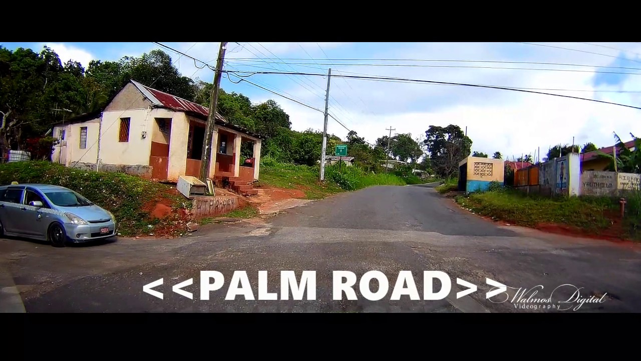 Driving on May Day Road, Mandeville | Walinton Mosquera