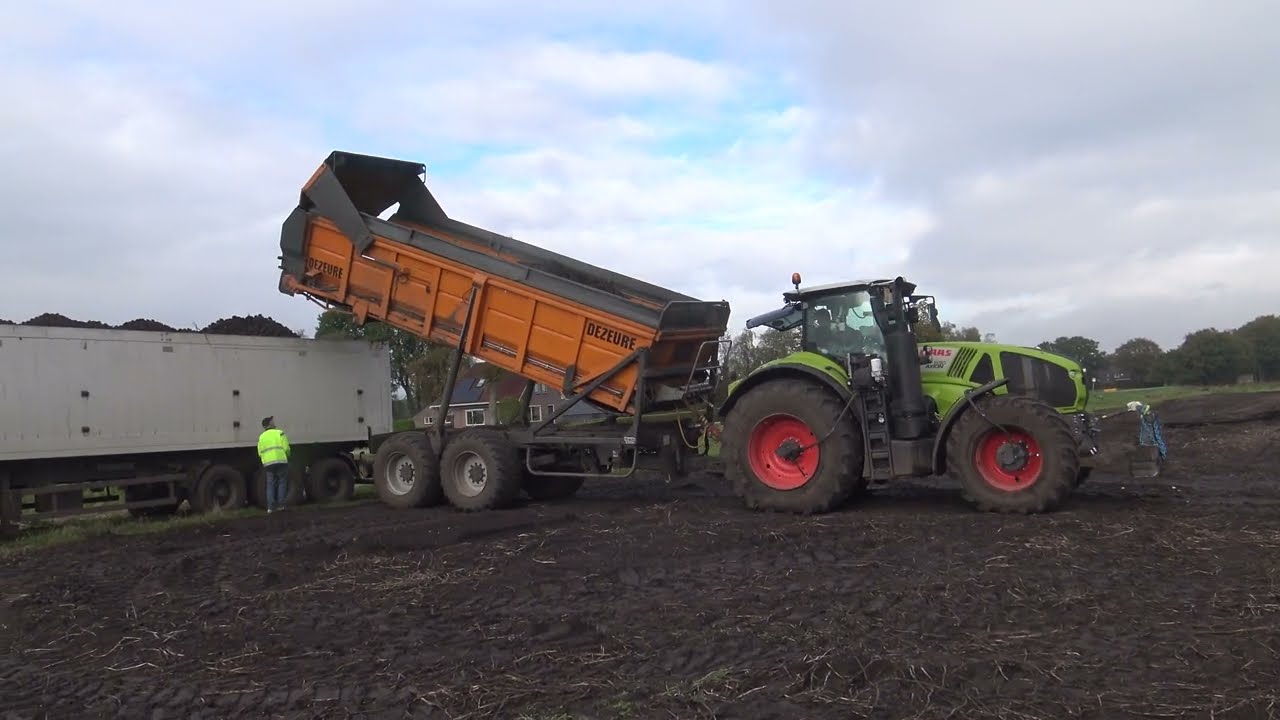 AARDAPPELS LADEN MET EEN CLAAS AXION 930 DEZEURE HOOGLOSSER
