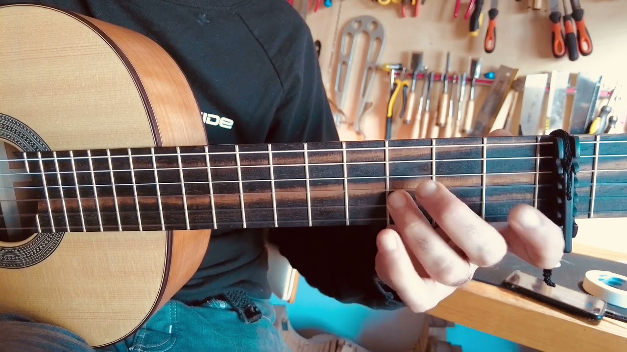 Drummond Flamenco 2021 with spruce top and cherry back and sides.