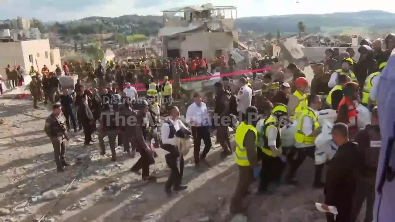 Emergency services at the scene after deadly strike in Beit Shemesh in central Israel