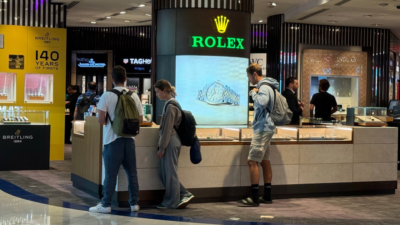 Rolex watch shopping at Dubai Airport 2024 - got my submariner here & level8 suitcase travel vlog