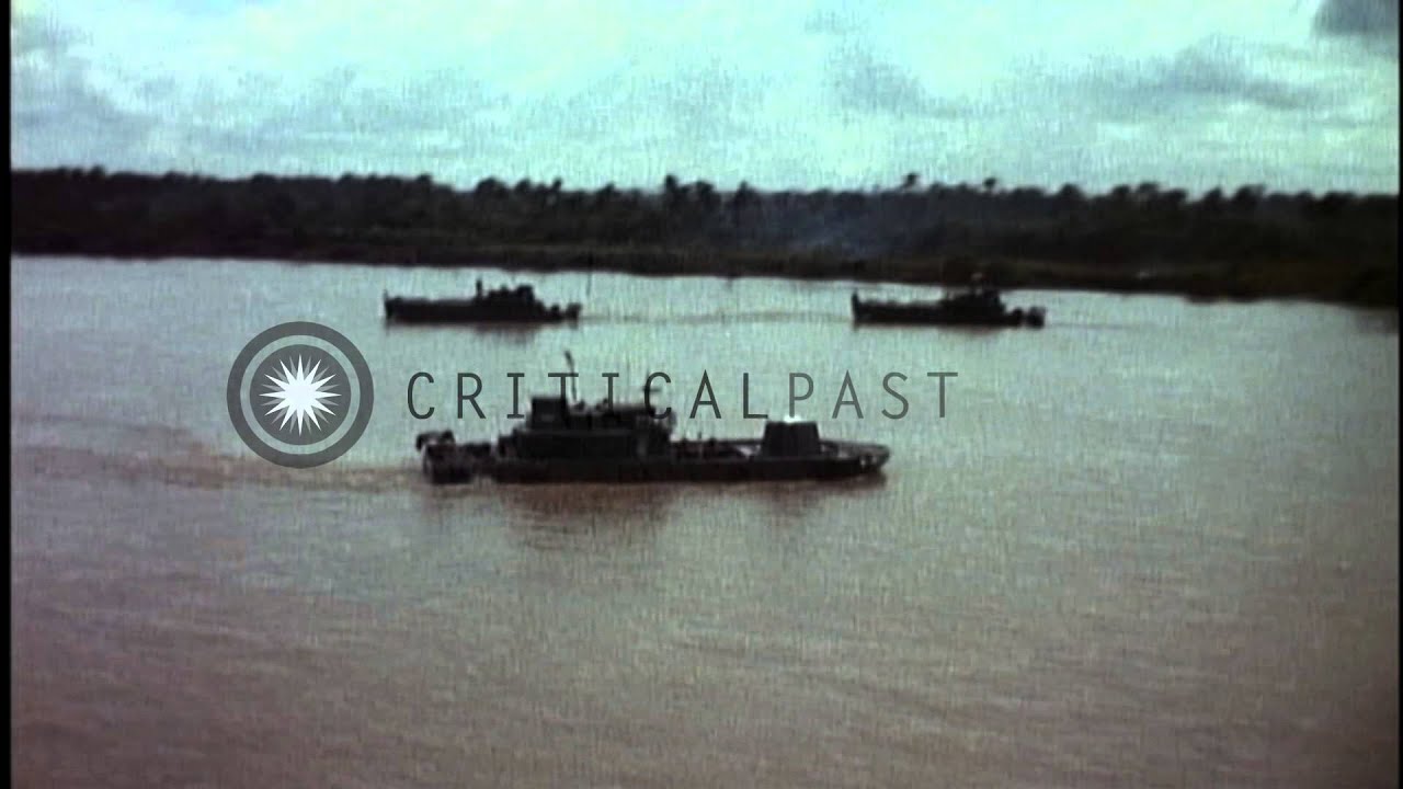 Riverine warfare in Mekong Delta, Vietnam. Barracks ship; Armored Transport ship; HD Stock Footage