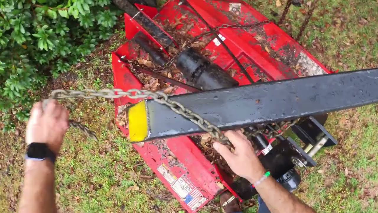 Retrieving the Brush Hog from the Back of the Property
