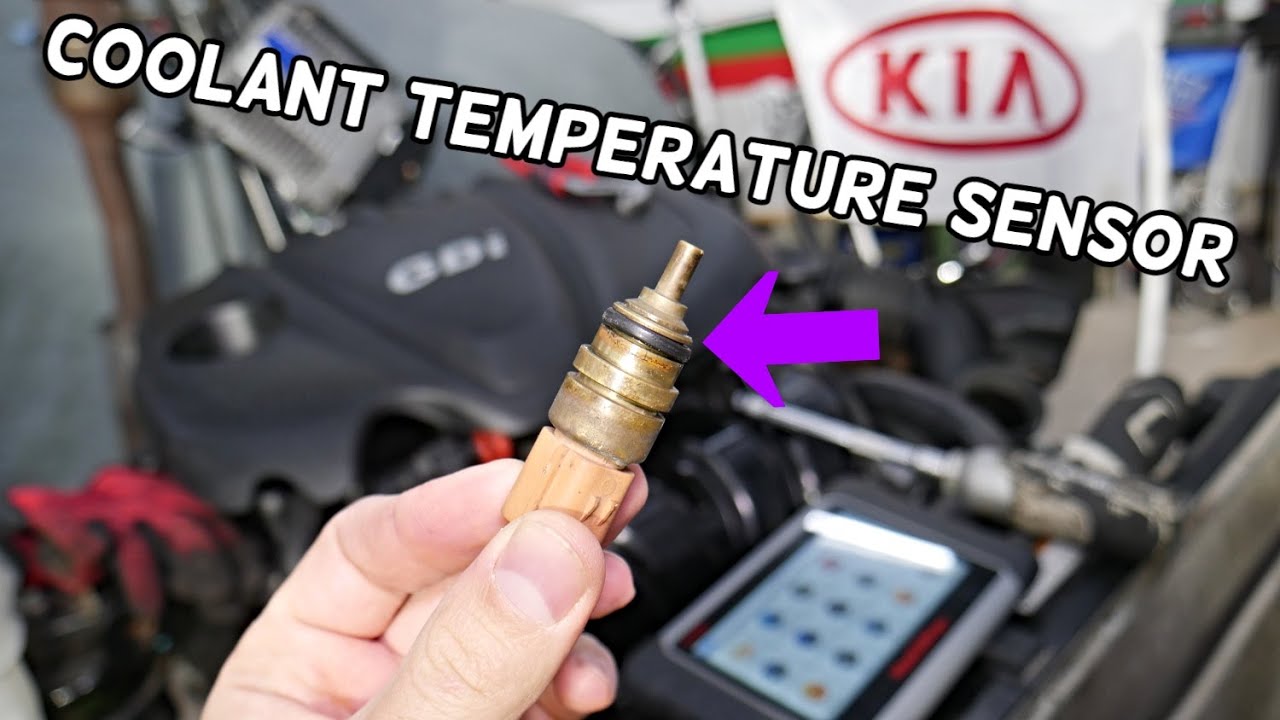 Место замены датчика температуры охлаждающей жидкости. Снятие. KIA SORENTO, KIA SPORTAGE
