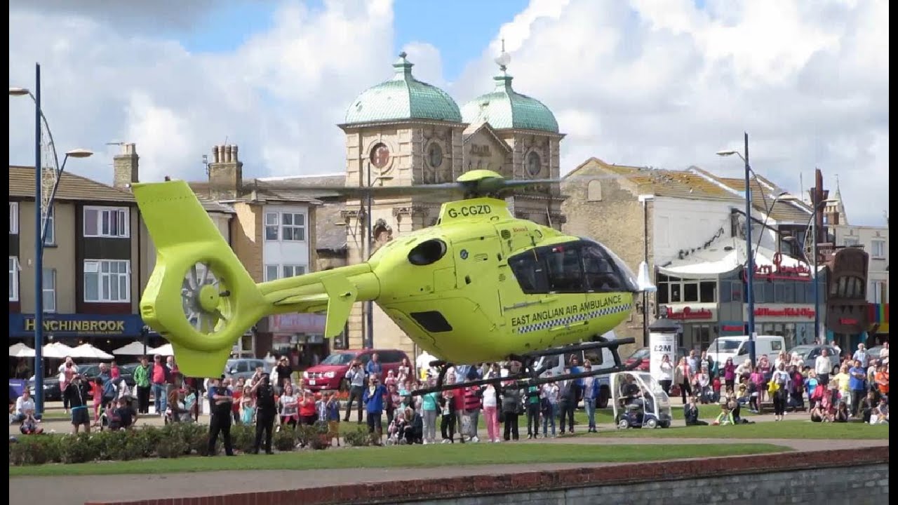 Air Ambulance Helicopter Takeoff from Seafront at Great Yarmouth and Lifts off Backwards