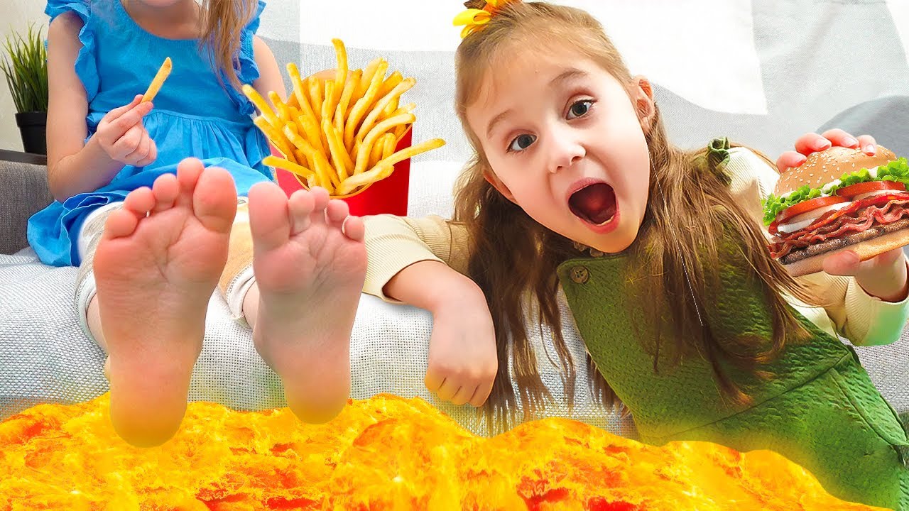 The floor is lava / Milana and sister Eva are playing in the Lava Challenge