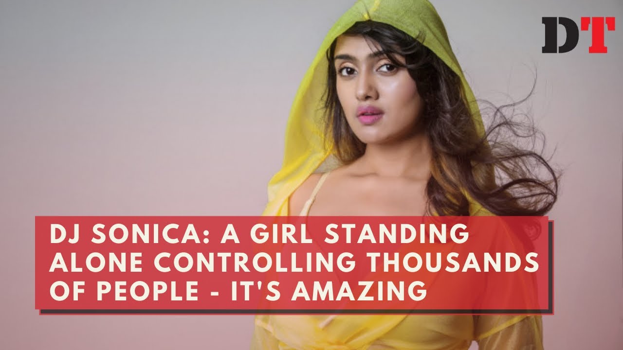 DJ Sonica: A girl standing alone controlling thousands of people - it's amazing