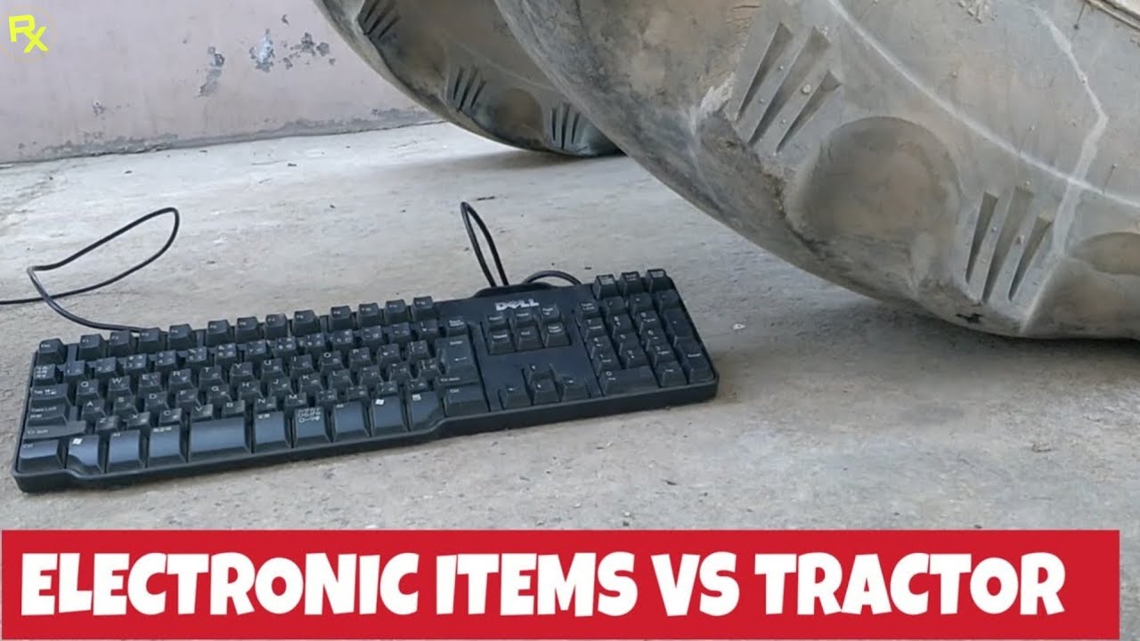 CRUSHING ELECTRONIC ITEMS UNDER TRACTOR TYRE