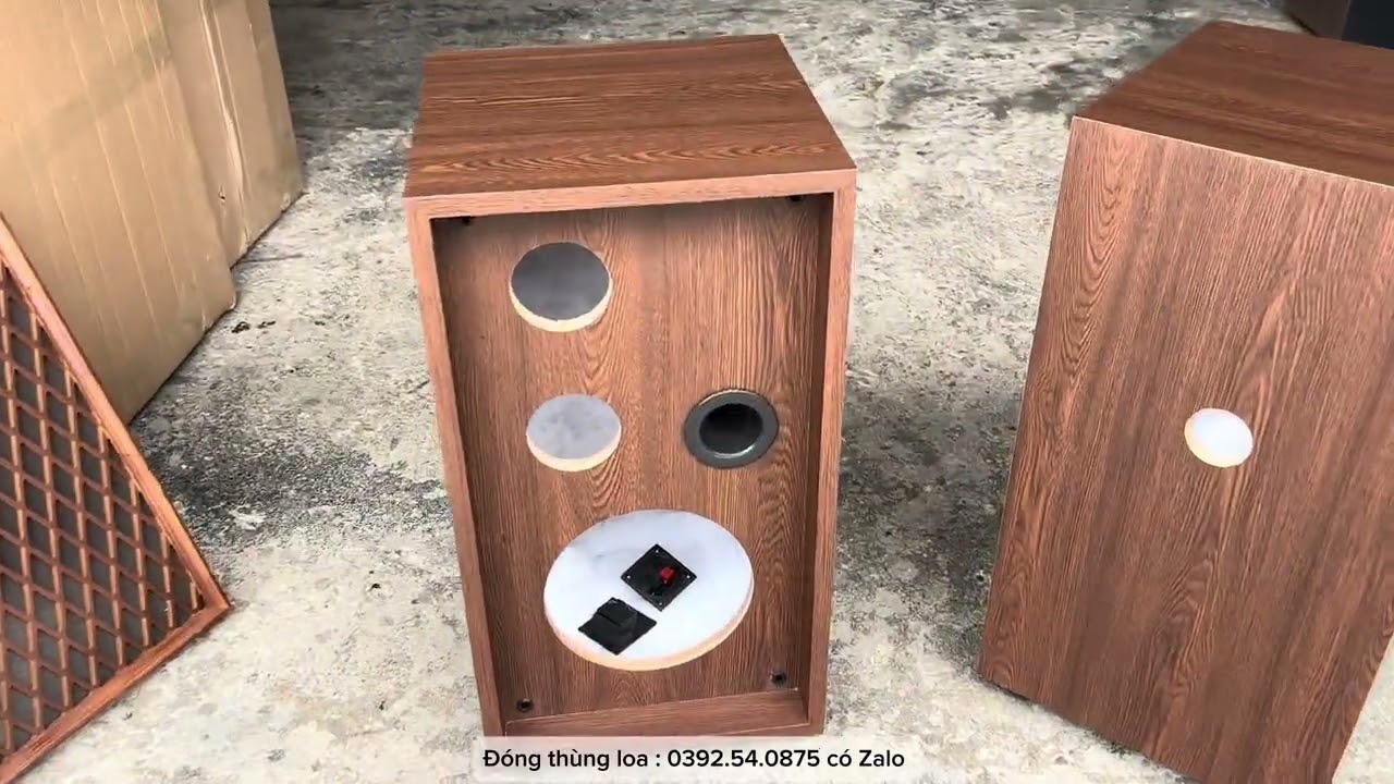 Thùng loa bass 20 đóng dùng lưới mắt cáo. Cao 55, rộng 30, sâu 30. Lh 0392.540.875