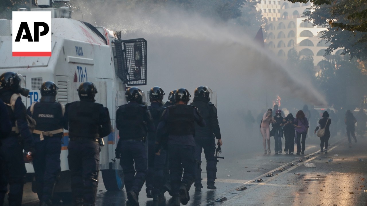 Police use tear gas and water cannons to push back protesters in Albania
