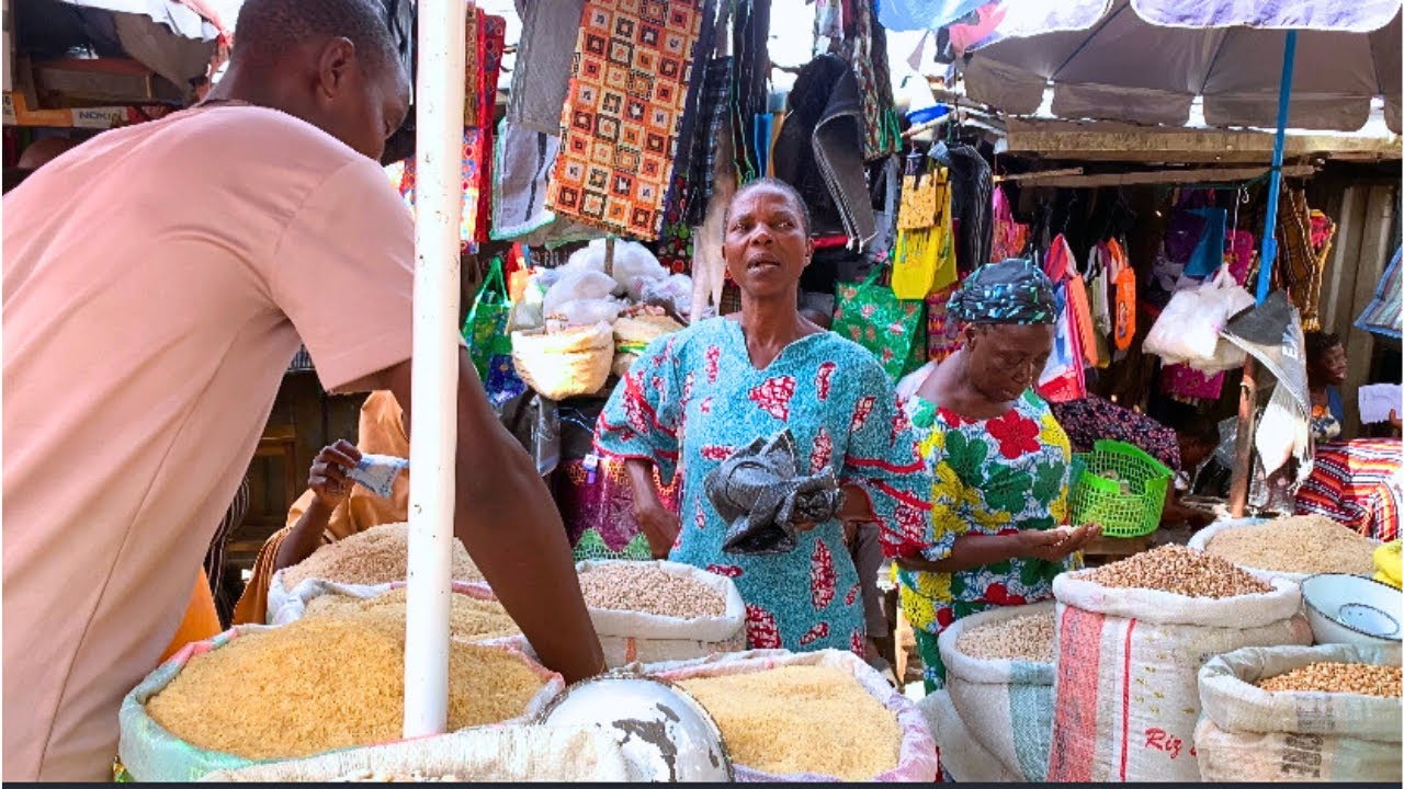 $18 IN A BIG LOCAL NIGERIAN MARKET IN 2024 | CURRENT COST OF FOOD ITEMS | NIGERIAN MARKET VLOG