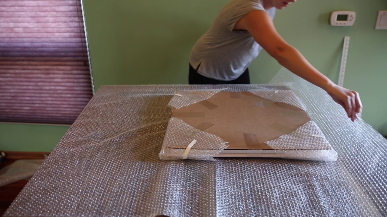 How to package canvas and framed artworks