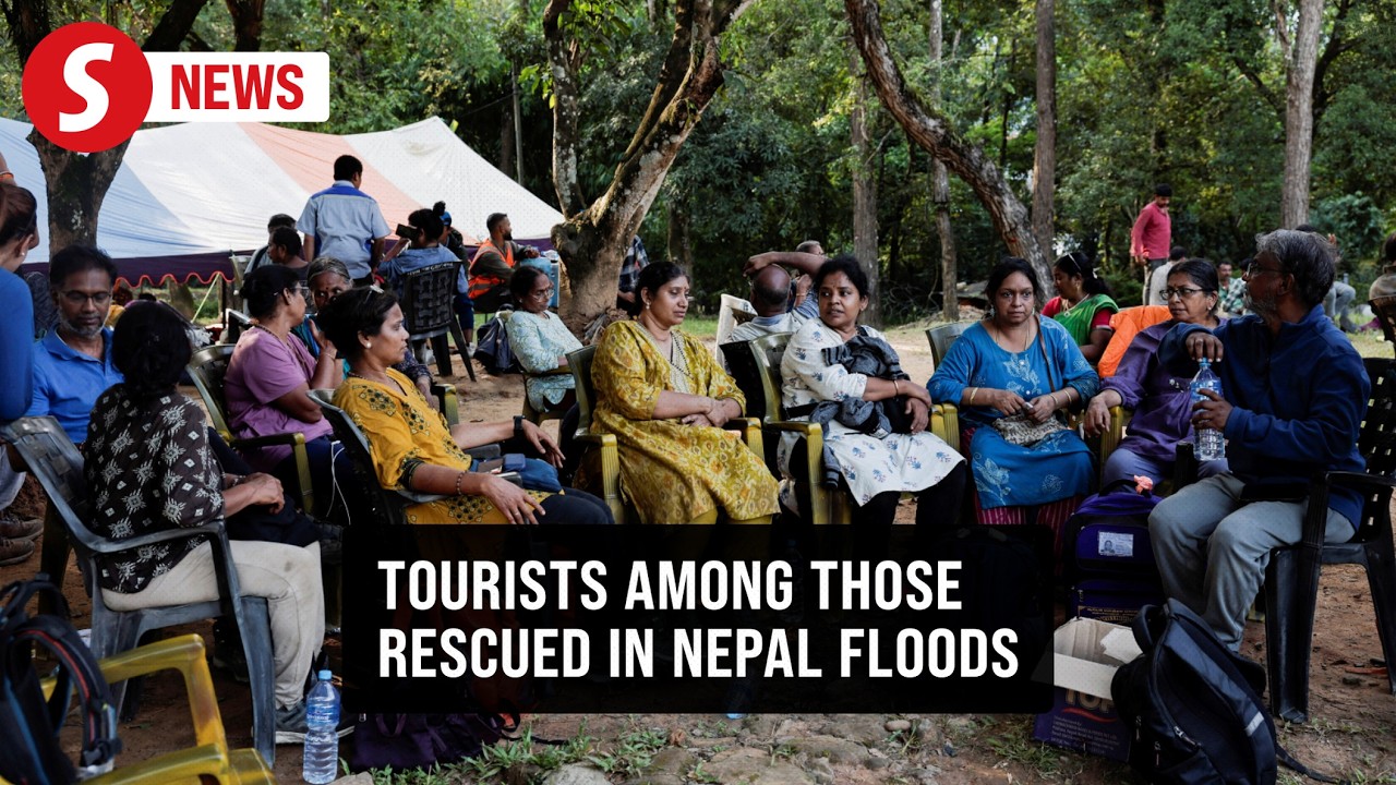 Tourists at military evacuation hub recount escape from deadly Nepal flood