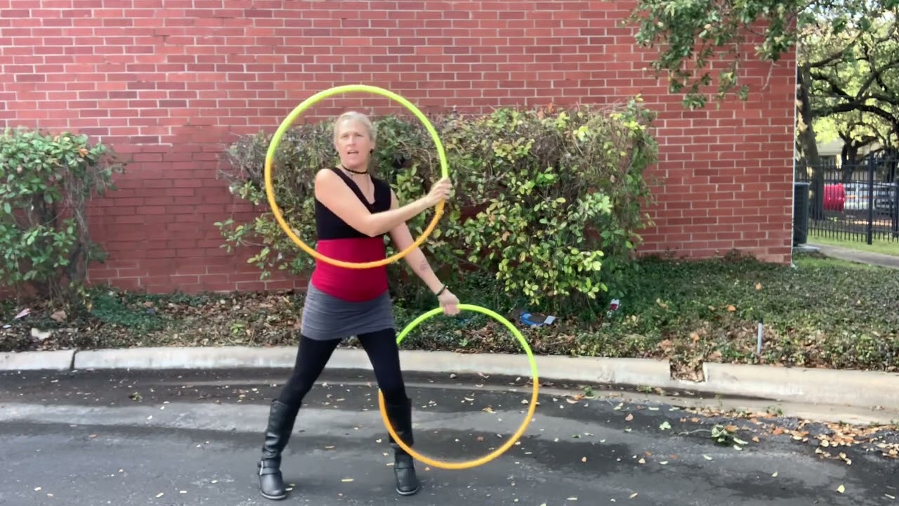 Arm roll pull through escalator twin hoop tutorial with Jasmine Kienne aka hothoopdancemama