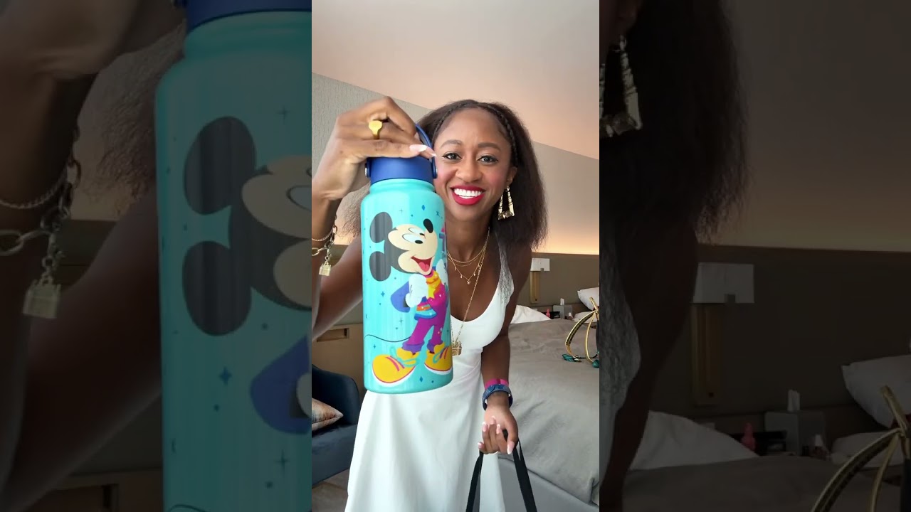 Disney merch for #disneyland70 is so cute 😍 obsessed with the vintage vibe! My favorite is the back