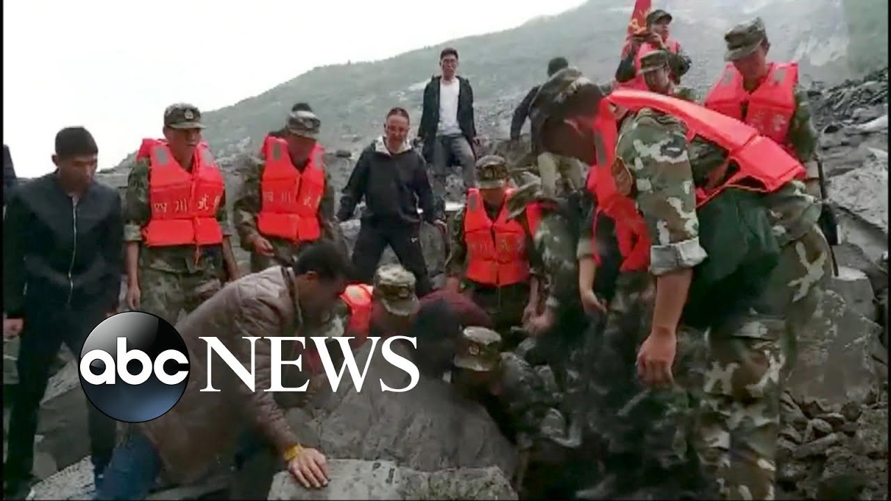 Desperate search for landslide survivors in China