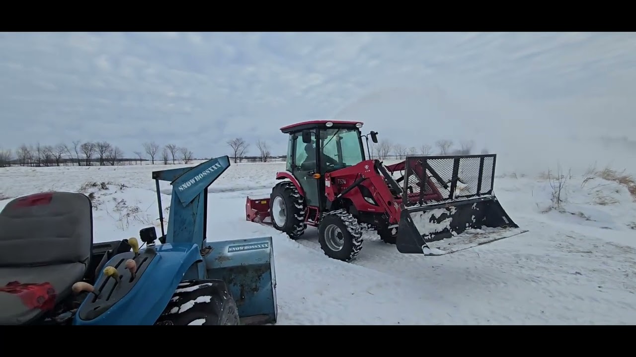 Newholland tc29d with 6 foot allied snowblower 
