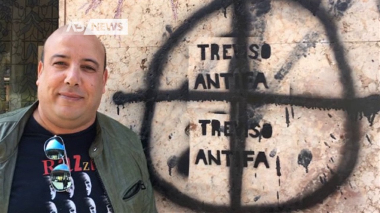 CROCE CELTICA SUL MURO DELLA COOP DEI MIGRANTI