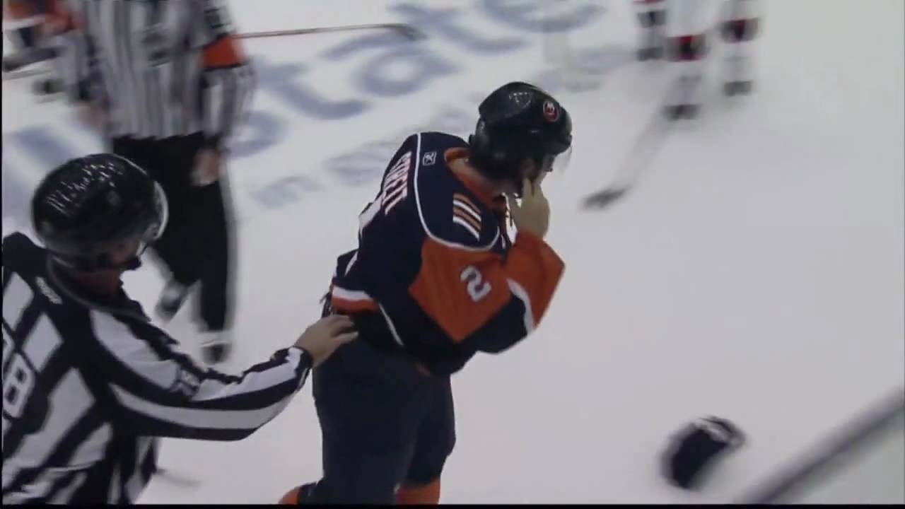Olivier Magnan-Grenier vs Mark Streit Sep 23, 2009