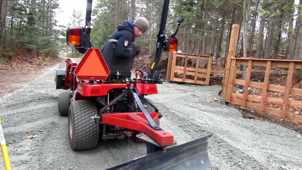 Spreading Gravel with 60'' rear blade Massey Ferguson GC2610