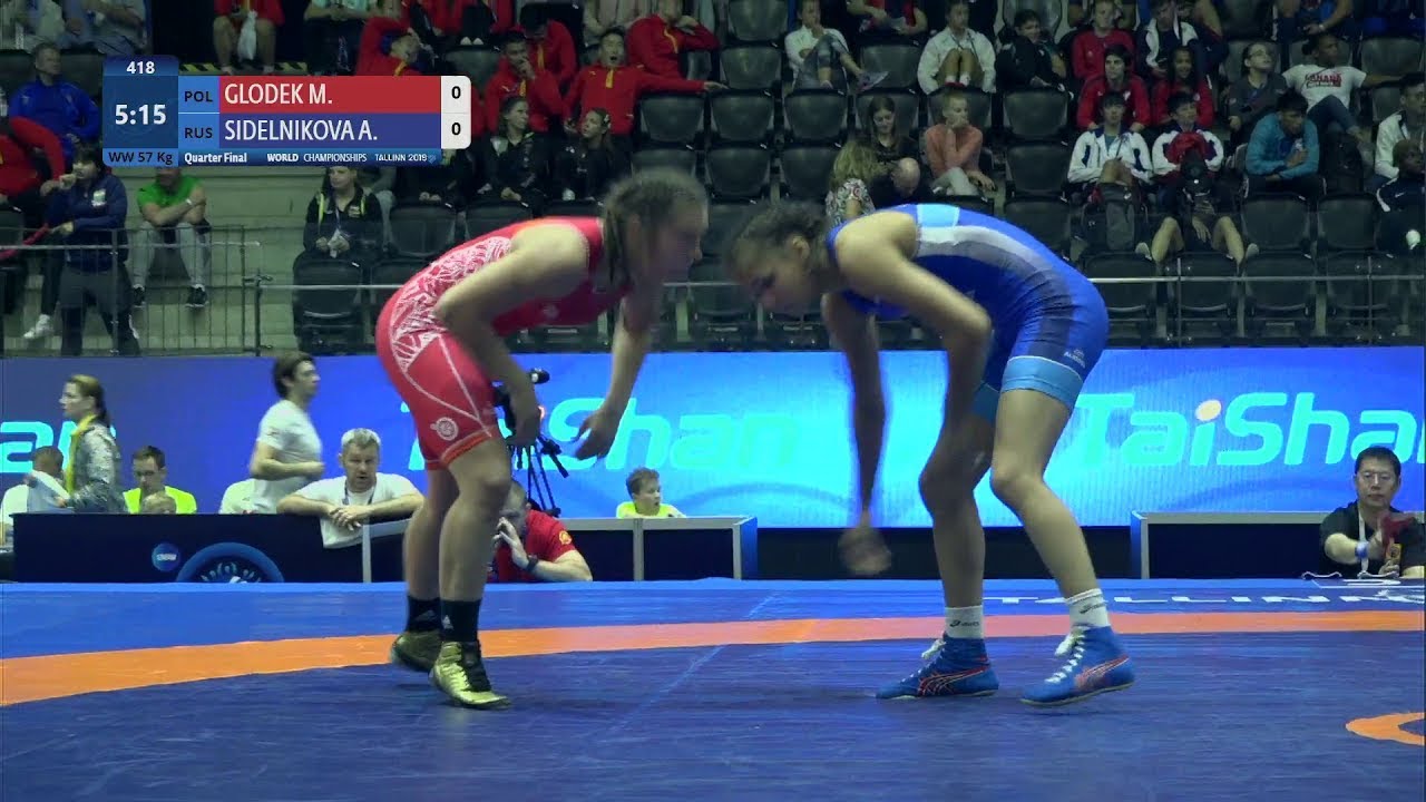 1/4 WW - 57 kg: M. GLODEK (POL) v. A. SIDELNIKOVA (RUS)
