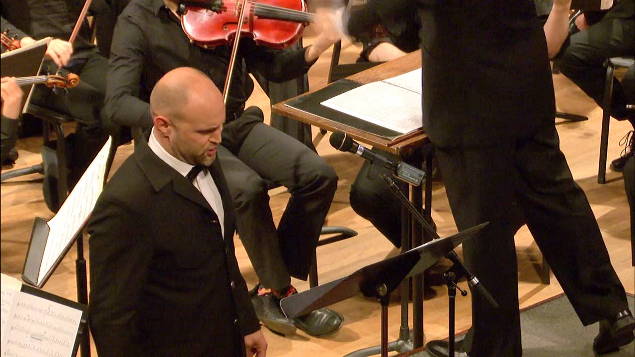 Dr. Joseph Bolin sings God Bless Us Everyone with UT Choirs and Symphony Orchestra