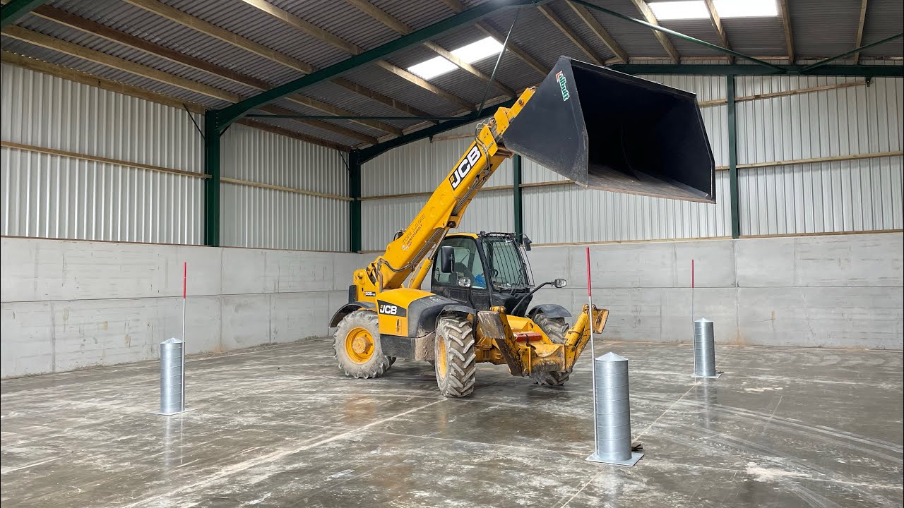 Build your own grain store/steel frame building (part 4) concrete floor and roller door