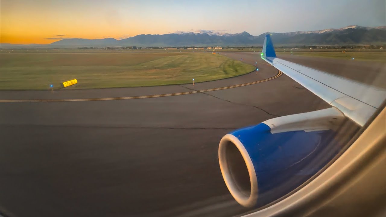 United Express Embraer 175 stunning sunset landing in Bozeman, MT