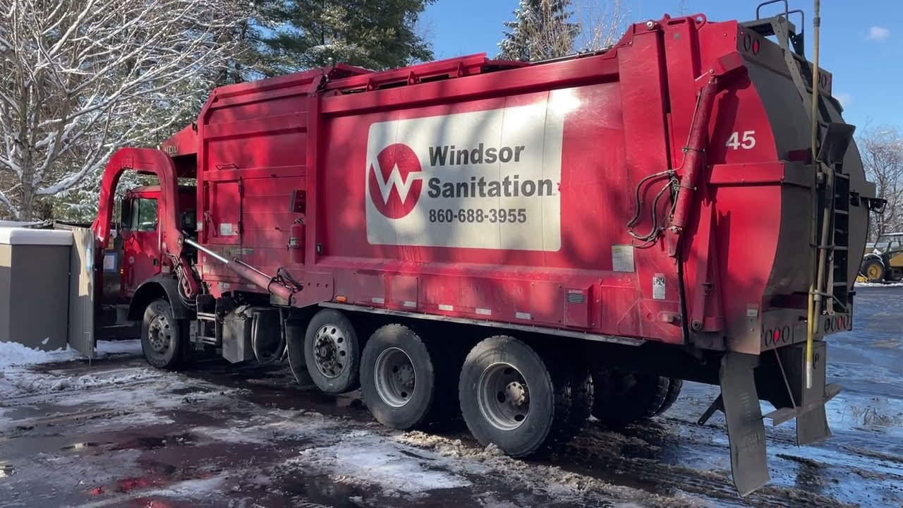 Windsor Sanitation Front Loader Slamming the Trash Dumpster at a Holiday Inn Express