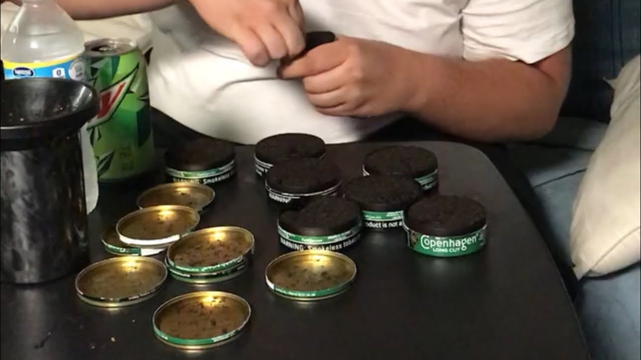 GUY BREAKS WORLD RECORD FOR MOST CANS OF CHEW IN MOUTH!!😱😳🤢