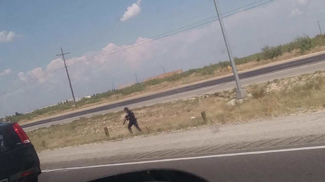 TX: ODESSA/MIDLAND SHOOTINGS - POLICE CARRIES GUN