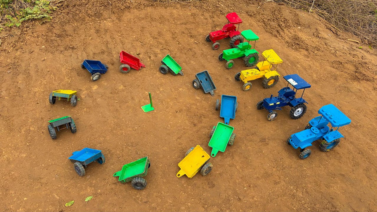 The tractor and its trolley are parked in a circle, waiting to be picked up.#167