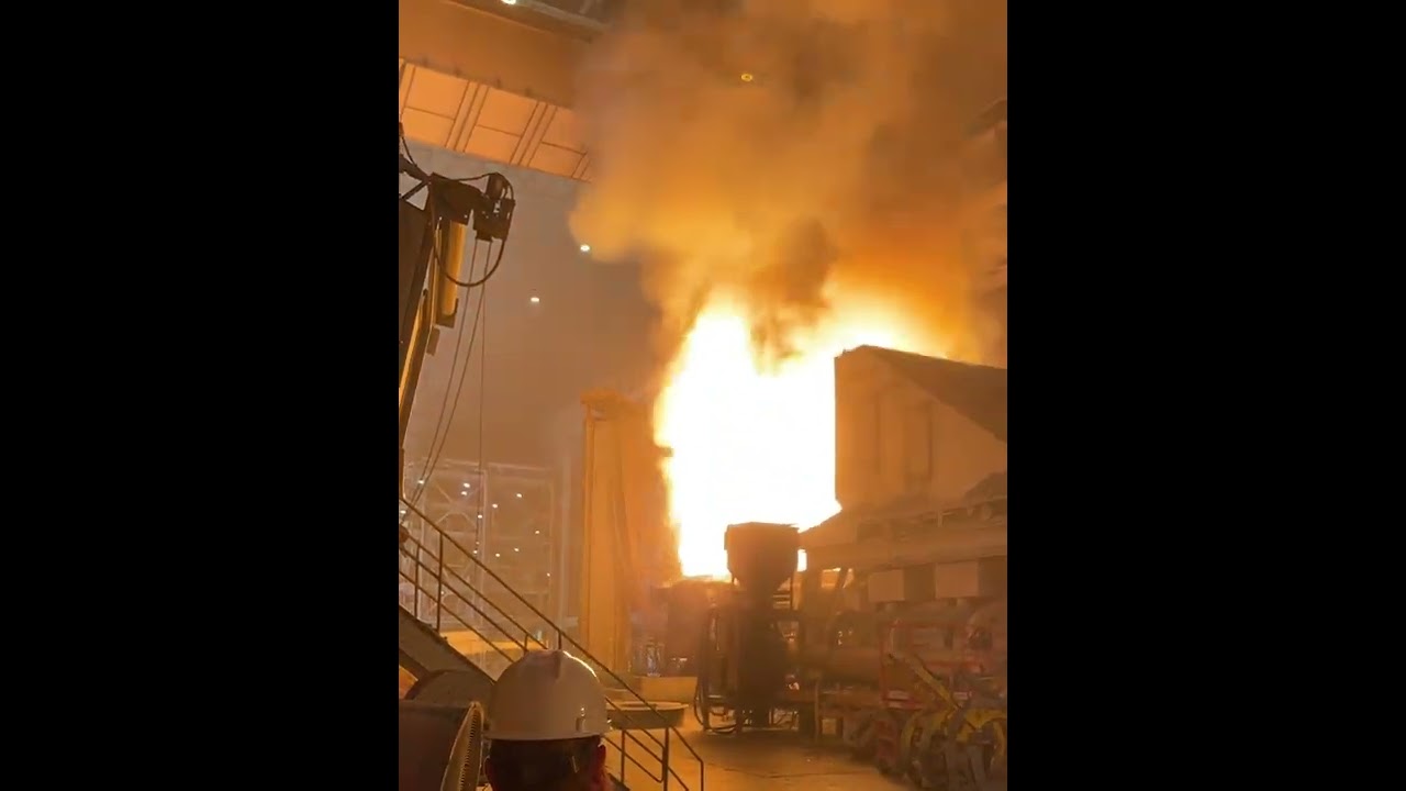 Scrap charge dropped into Electric Arc Furnace