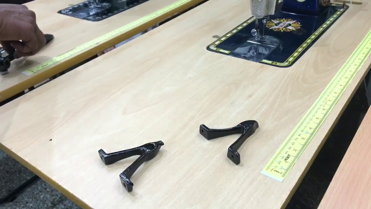 KNEE LIFTER INSTALLATION FOR SEWING MACHINES
