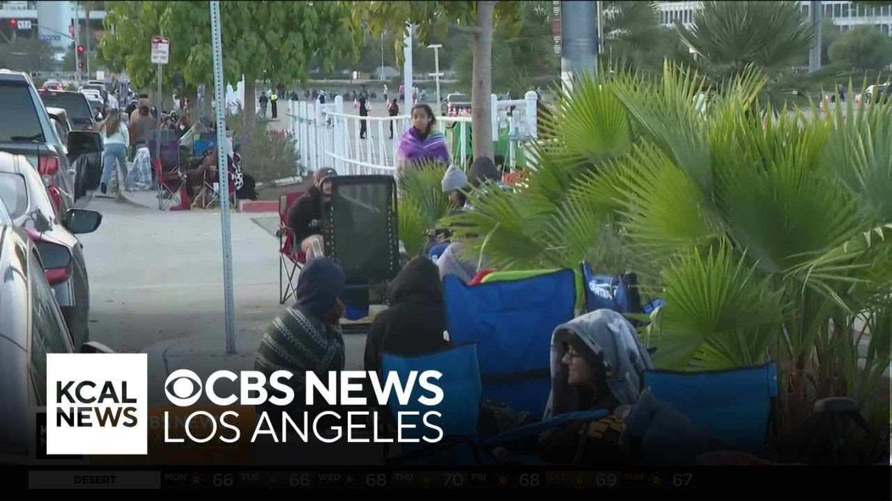 Billie Eilish fans line up outside the Kia Forum