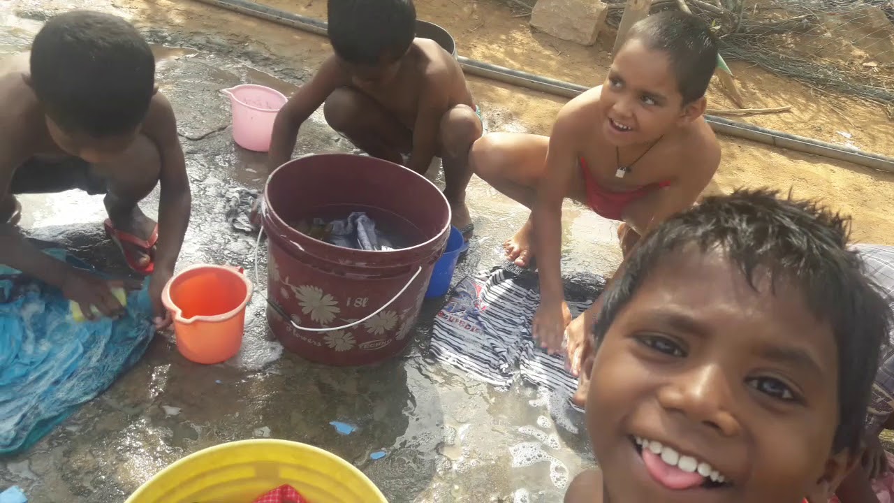 Hostel children washing their clothes