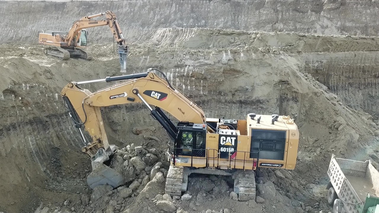 Cat 6015B Excavator, Cat D9T Dozer And Liebherr 934 With Hyd. Hammer In Action - Sotiriadis Mining