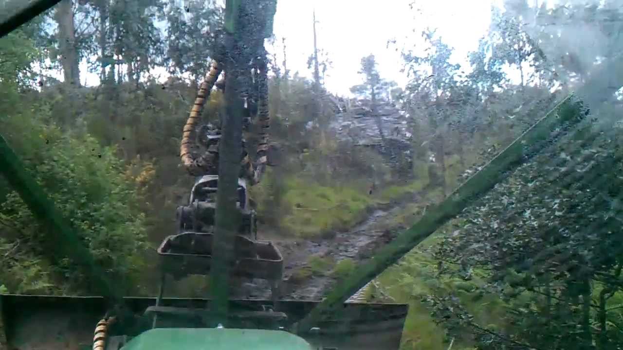 John Deere 6620 equipo toimil sacando madera