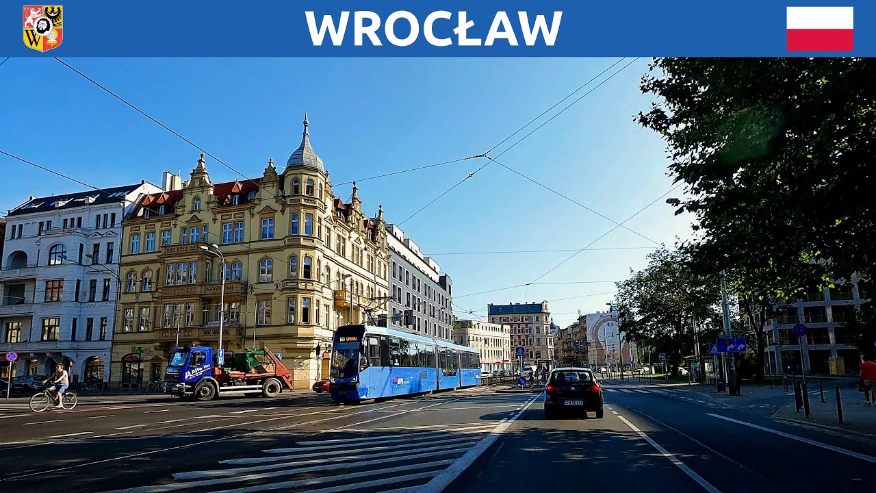 Driving in Wrocław, Poland. Morning ride through the city center. 4K